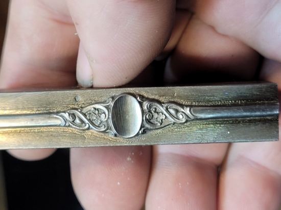 Picture of Scroll ring from Shreve and Co.  **DUPE OF XX-003 DO NOT PUBLISH**