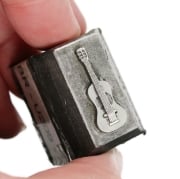 Picture of Impression Die Small Guitar Front and Back