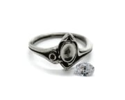 Picture of Impression Die A Study in Asymmetry Humpback Ring