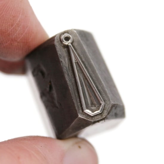 Picture of Impression Die Geometric Tear Charm