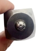 Picture of Impression Die Melting Beads and a Smile