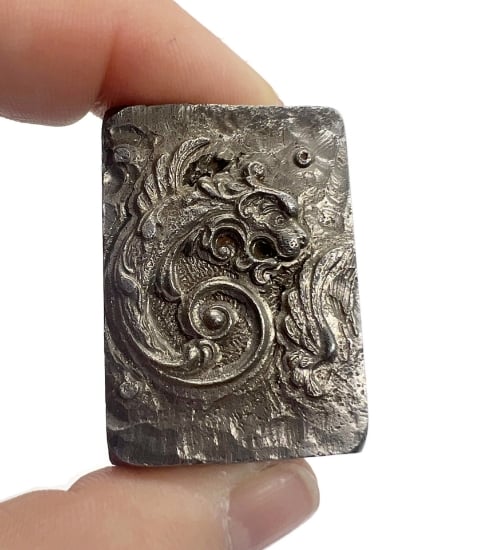 Picture of Impression Die Dragon Chasing Its Wing