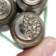 Picture of Impression Die Floral Czech Glass Buttons Shot Plate