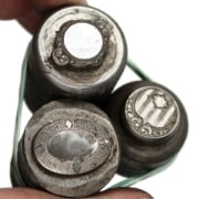 Picture of Impression Die Engraved Buttons & Tops