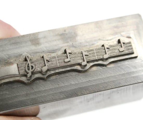 Picture of Impression Die Music Sheet Keychain