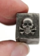 Picture of Impression Die Tiny Skull & Crossbones with Settings