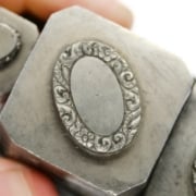 Picture of Impression Die Flourish Bezel Shot Plate